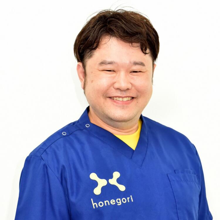 髙塚　功一